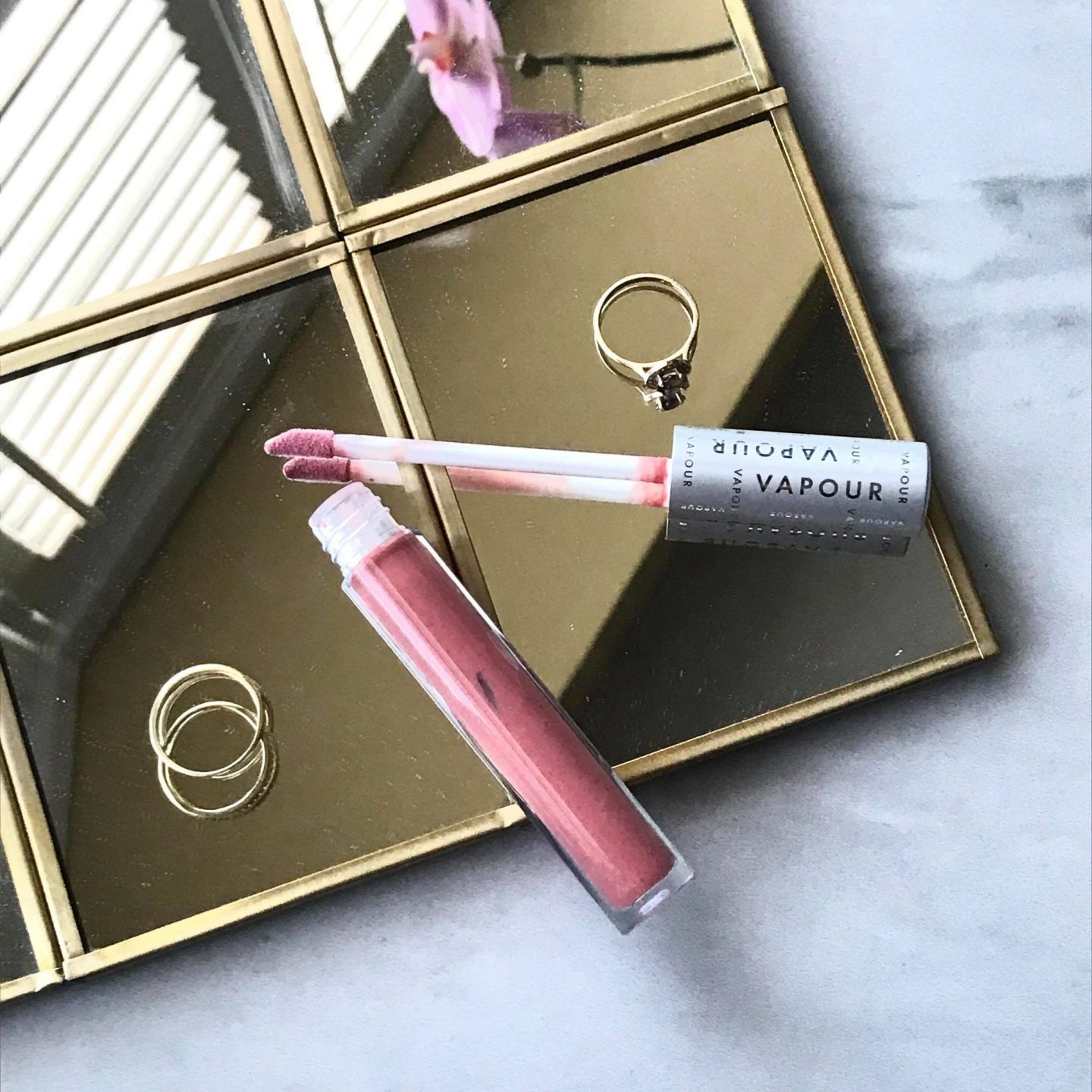 vapour beauty trust elixir lip gloss