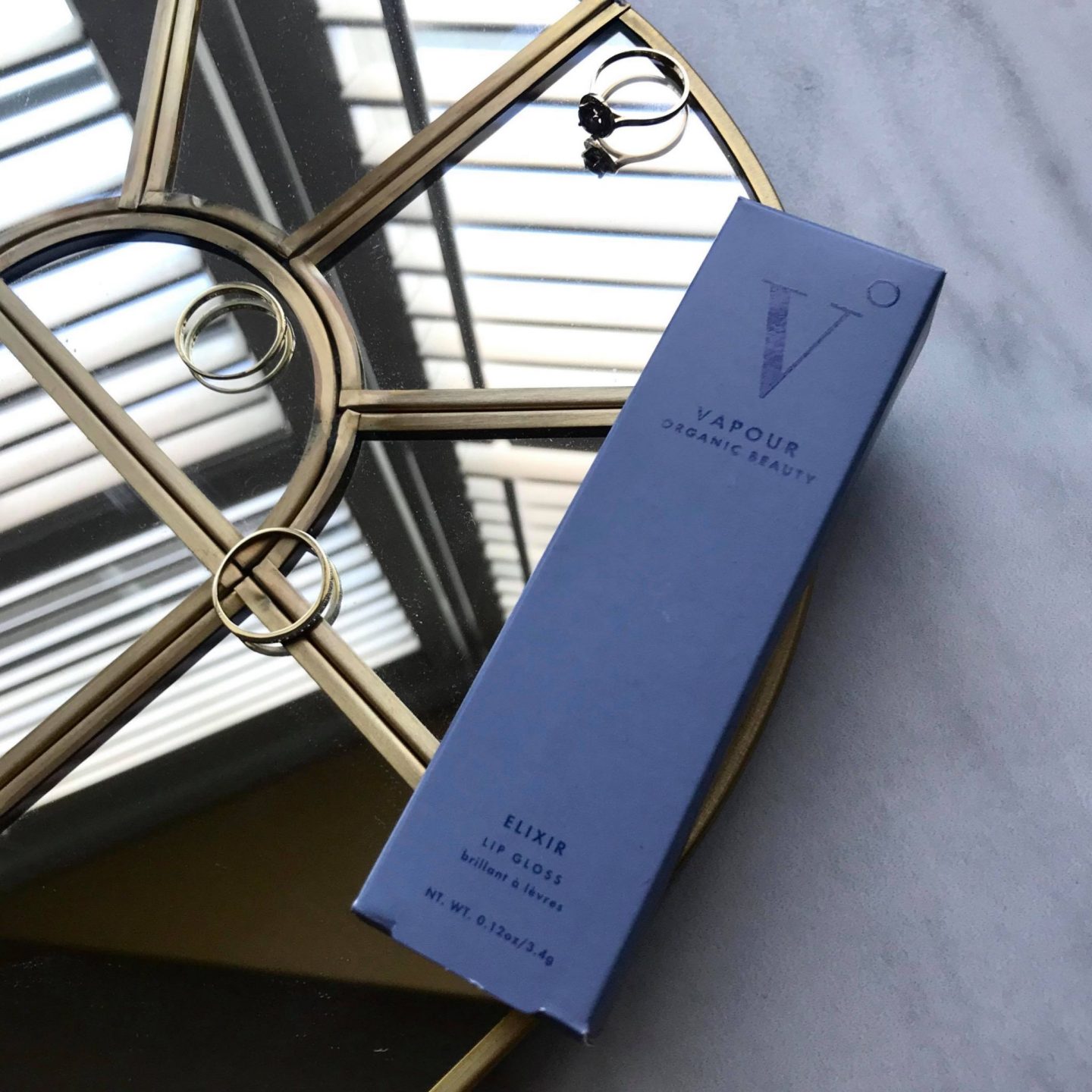 vapour beauty trust elixir lip gloss