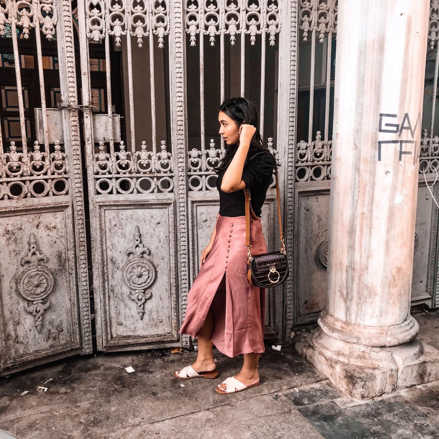 outfit 5- black shirt with puff sleeves, chloe bag, pink zara midi silky skirt with white sandals