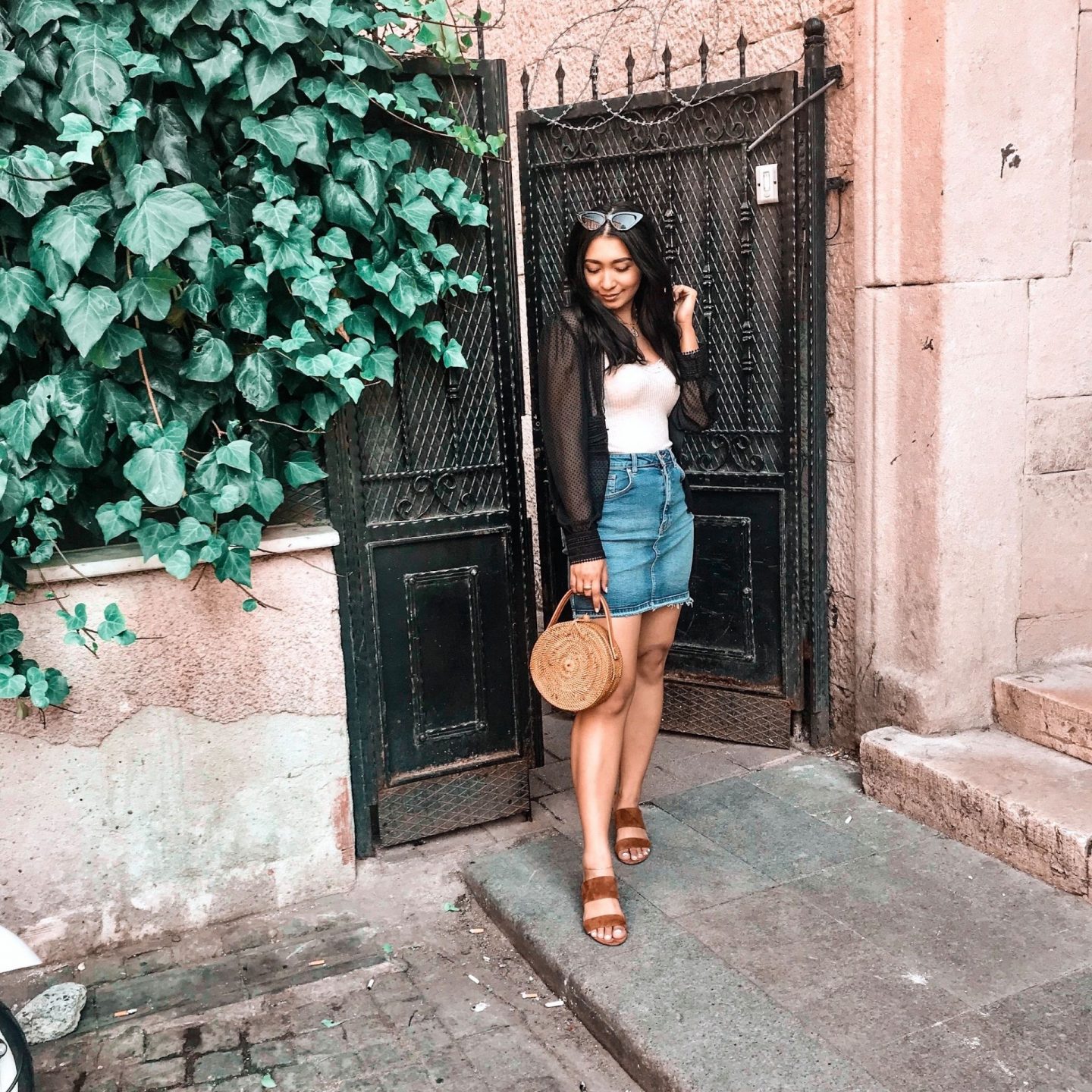 outfit 4- white knit shirt with black sheer cardi. zara denim skirt with vince camuto sandals