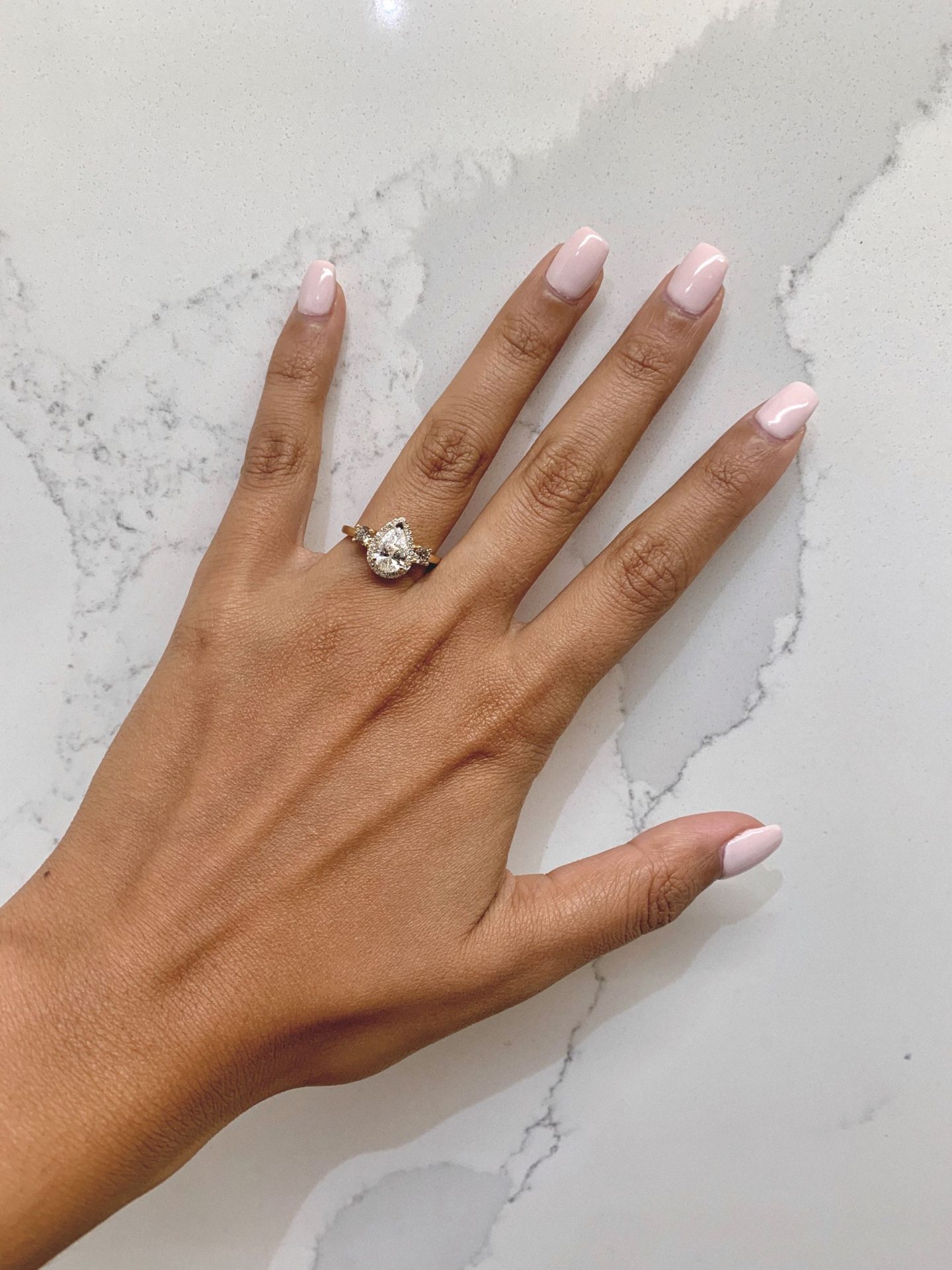 the stunning 1 carat pear shaped gold ring